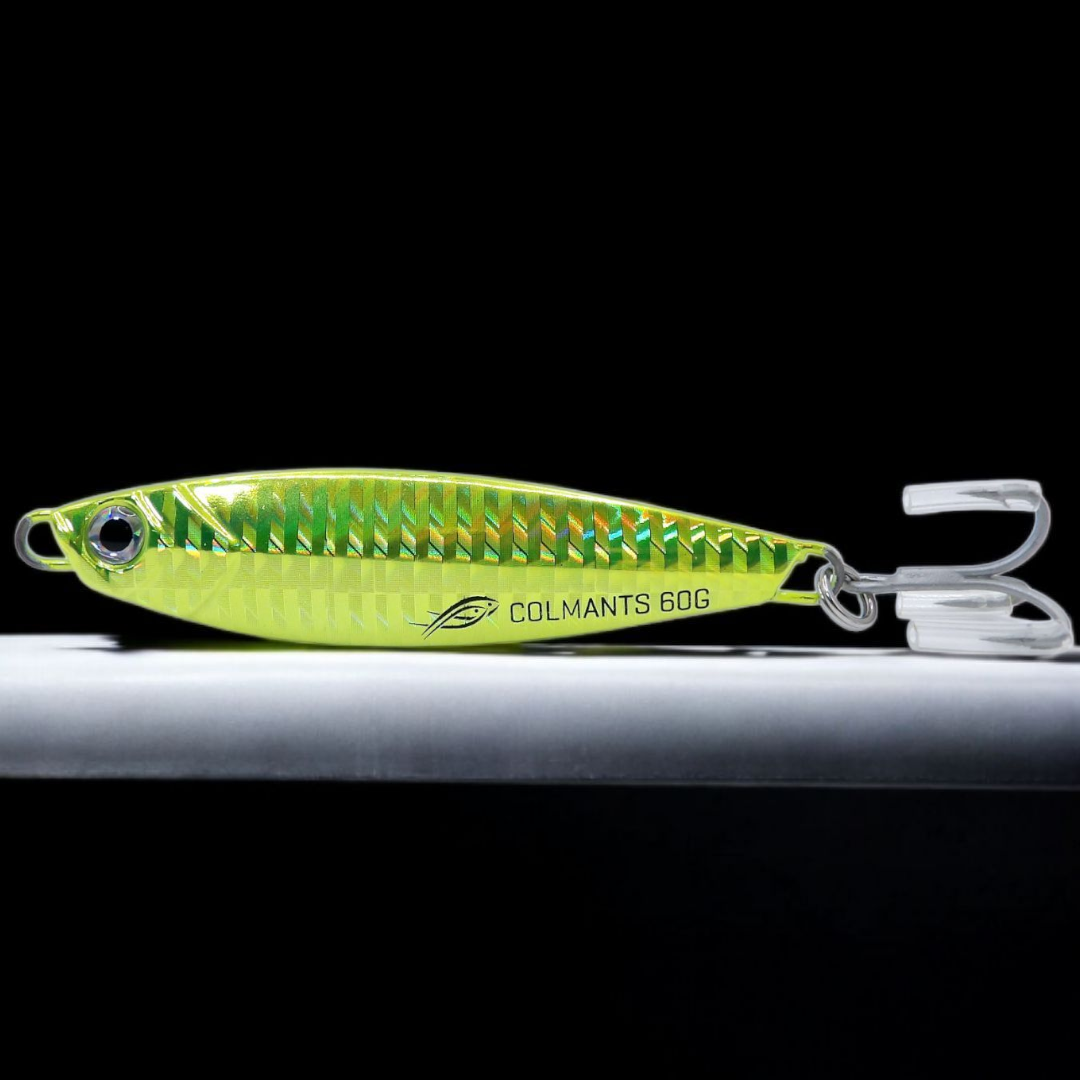 A holographic green and chartreuse fishing lure with reflective patterns and a VMC hook. Castman Lime Chartreuse color