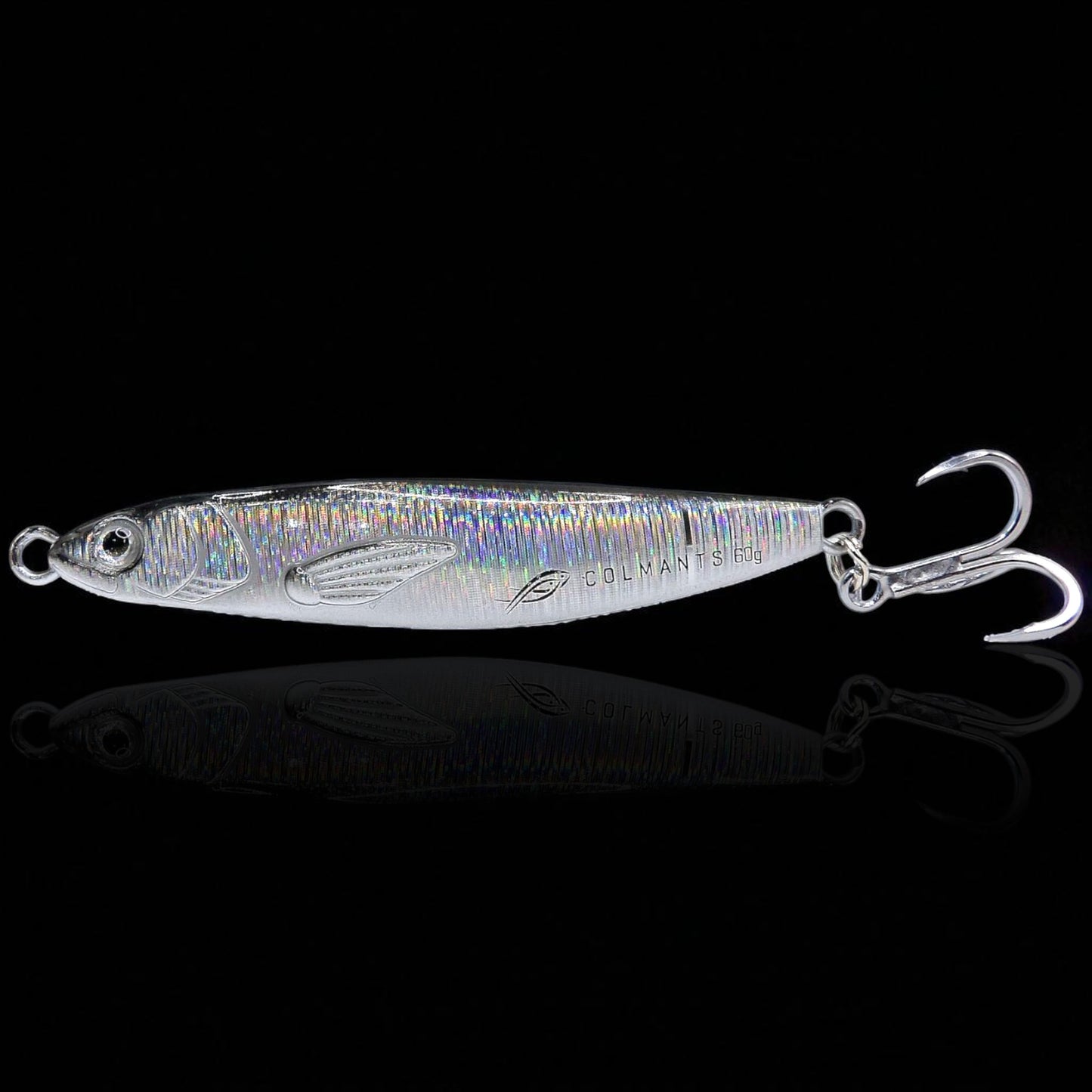 Metallic fishing lure with treble hooks on a black background