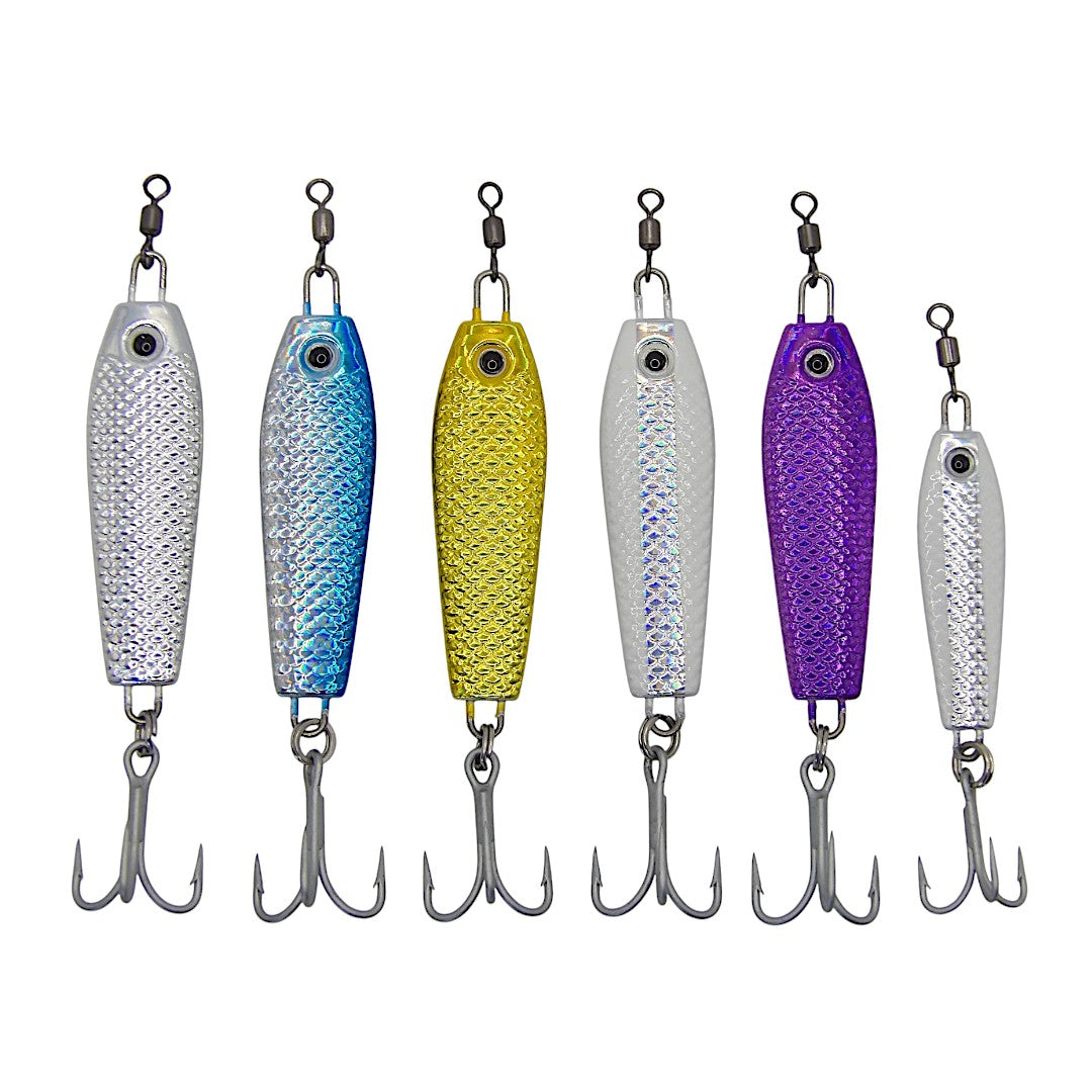 Set of six colorful fishing lures on a white background. Sparkle spoon colors from left to right, silver, blue, gold, glow silver, purple