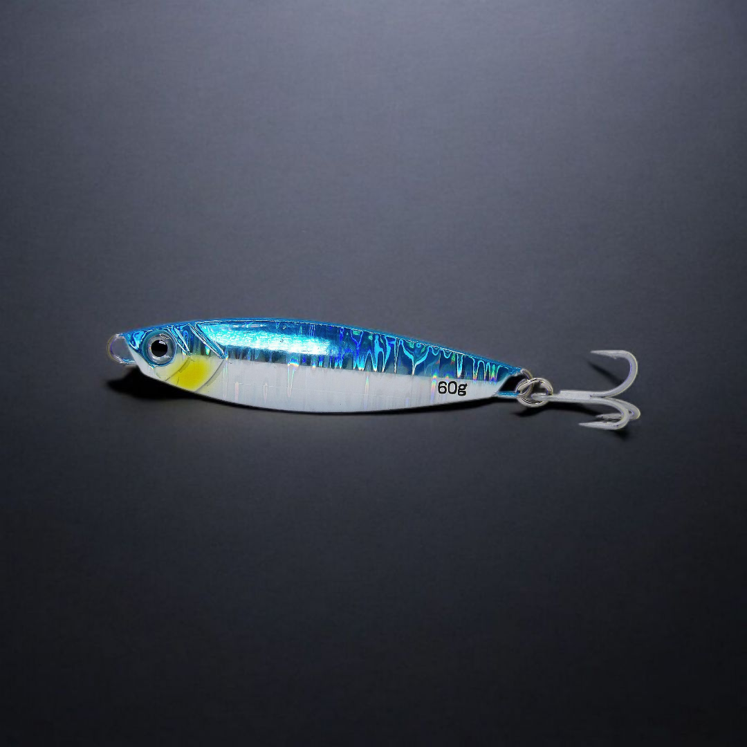 Blue and silver fishing lure on a black background. CastMan Shimmer Blue color