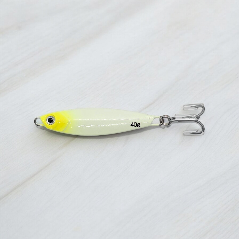 Castman Casting Minnow White/Yellow. Low light glow. Close view best saltwater fishing lure